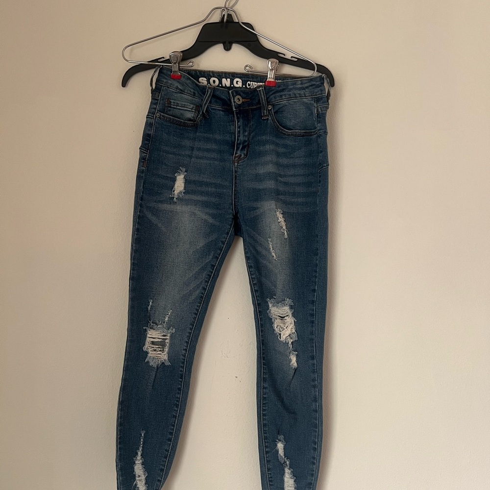 Women's Distressed Blue Jeans